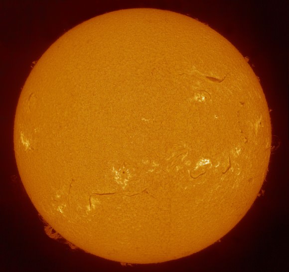 Full disk view of the Sun on August 20, 2013. The 'small' prominences on the right side of the Sun in this image are the ones captured in the closeup image above -- not the bigger prominences on the left side. Credit and copyright: Michel Collart. 