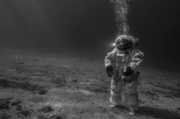 European Space Agency astronaut Jean-François Clervoy recreates the first moon landing mission underwater. Credit: Alexis Rosenfeld
