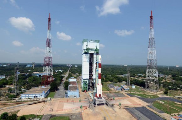Gorgeous view of the majestic Polar Satellite Launch Vehicle, PSLV C25 with its passenger, the Indian Space Research Organization’s (ISRO's) Mars Orbiter Mission (MOM) spacecraft inside. The Mobile service tower is also seen in the background.  Credit: IRSO