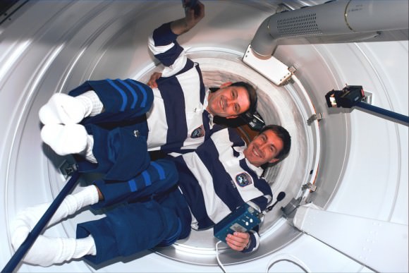 NASA astronaut Bob Cabana (left) and Russian cosmonaut Sergei Krikalev just outside the hatch to the Zarya Russian module  on Dec. 10, 1998. Credit: NASA