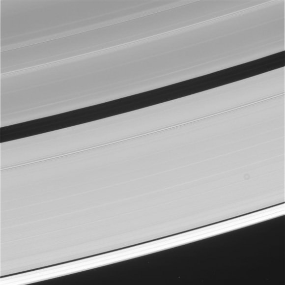 Although Saturn's rings look solid and substantial in images such as this, they are made up of many tiny, icy objects collecting as thin as 6.2 miles (10 kilometers) deep.  Image taken by the Cassini spacecraft in February 2014. Credit: NASA/JPL/Space Science Institute