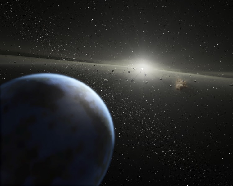 Artist’s impression of a massive asteroid belt in orbit around a star. Earth's water may not have all come from asteroids and comets, so maybe that's true for exoplanets. Credit: NASA-JPL / Caltech / T. Pyle (SSC)
