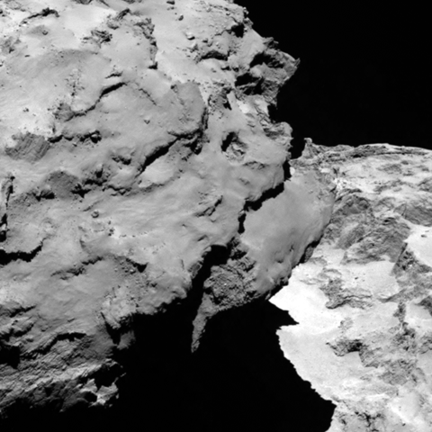Close-up detail of comet 67P/Churyumov-Gerasimenko. The image was taken by Rosetta’s OSIRIS narrow-angle camera and downloaded today, 6 August. The image shows the comet’s ‘head’ at the left of the frame, which is casting shadow onto the ‘neck’ and ‘body’ to the right.  The image was taken from a distance of 120 km and the image resolution is 2.2 metres per pixel. Credit: ESA/Rosetta/MPS for OSIRIS Team MPS/UPD/LAM/IAA/SSO/INTA/UPM/DASP/IDA