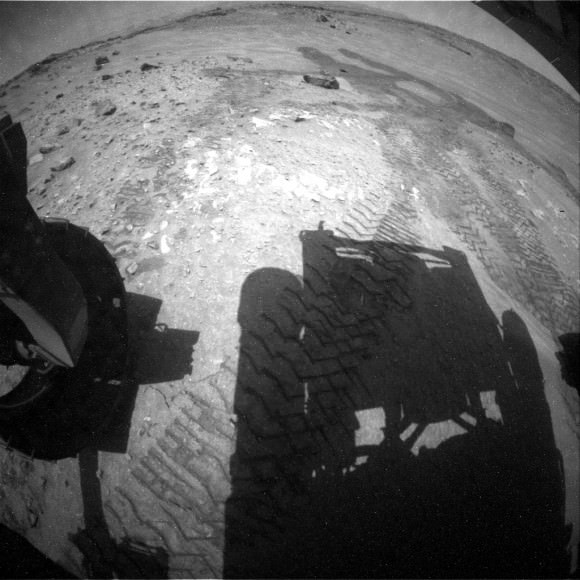 A shadow of Mars Curiosity lies across the surface in this picture taken Aug. 9, 2014. Credit: NASA/JPL-Caltech