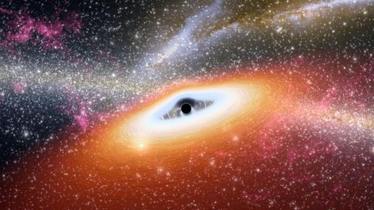 Hubble Sees Possible Runaway Black Hole Creating a Trail of Stars
