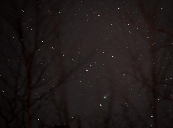 A comet hung up among the winter trees... Credit and Copyright: Per/Kam75