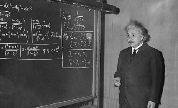 Prof. Albert Einstein uses the blackboard as he delivers the 11th Josiah Willard Gibbs lecture at the meeting of the American Association for the Advancement of Science in the auditorium of the Carnegie Institue of Technology Little Theater at Pittsburgh, Pa., on Dec. 28, 1934. Using three symbols, for matter, energy and the speed of light respectively, Einstein offers additional proof of a theorem propounded by him in 1905 that matter and energy are the same thing in different forms. (AP Photo)
