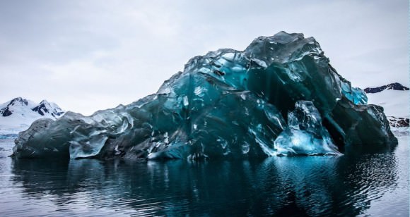 A zoomed out version of a flipped iceberg in Cierva Cove, Antarctica. Credit and copyright: Alex Cornell. 