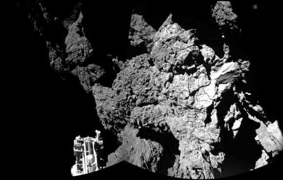 First image taken by Philae after landing on the comet on November 12, 2015. It shows a steep cliff and one of the  lander's legs. Credit: ESA/ROSETTA/PHILAE/CIVA