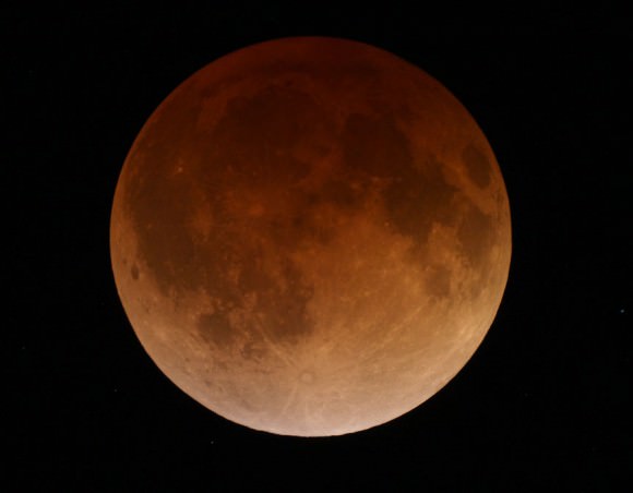 The totally eclipsed moon on April 15, 2014 from Duluth, Minn. This was the first in the series of four eclipses called a tetrad. Some refer to this lunar eclipse as a “Blood Moon” because it coincides with the Jewish Passover. Credit: Bob King 
