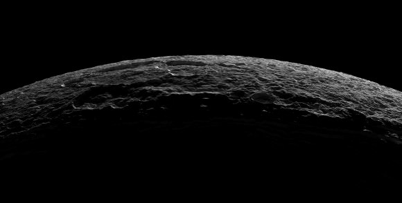 Crescent Dione from Cassini, October 11, 2005. The crater near the limb at top is Alcander, with larger crater Prytanis adjacent to its left. At lower right, several of the Palatine Chasmata fractures are visible, one of which can be seen bisecting the smaller craters Euryalus (right) and Nisus. NASA / Jet Propulsion Laboratory / Space Science Institute