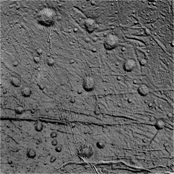 Craters and fractures dot the landscape of the northern region of Enceladus in this raw image from the Cassini spacecraft taken on October 14, 2015.  Credit: NASA/JPL-Caltech/Space Science Institute.