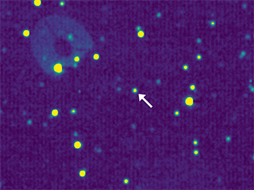 This image, taken with the LORRI instrument aboard New Horizons, shows 2 of the 20 images captured in April. The moving dots are 1994 JR1, shown against a backdrop of stationary stars. The circular object in the top left of the image is a reflective artifact of the camera itself, showing LORRI's three support arms. Image: NASA/Johns Hopkins University Applied Physics Laboratory/Southwest Research Institute 