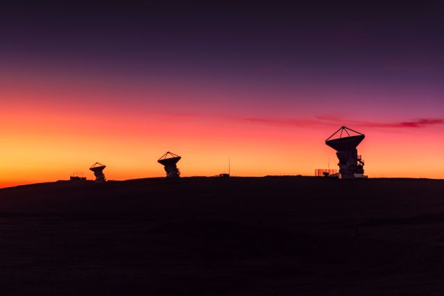 Three of the dishes that make up the Atacama Large Millimeter / Submillimter Array (ALMA). Image credit: H. Calderón - ALMA (ESO / NRAO / NAOJ)