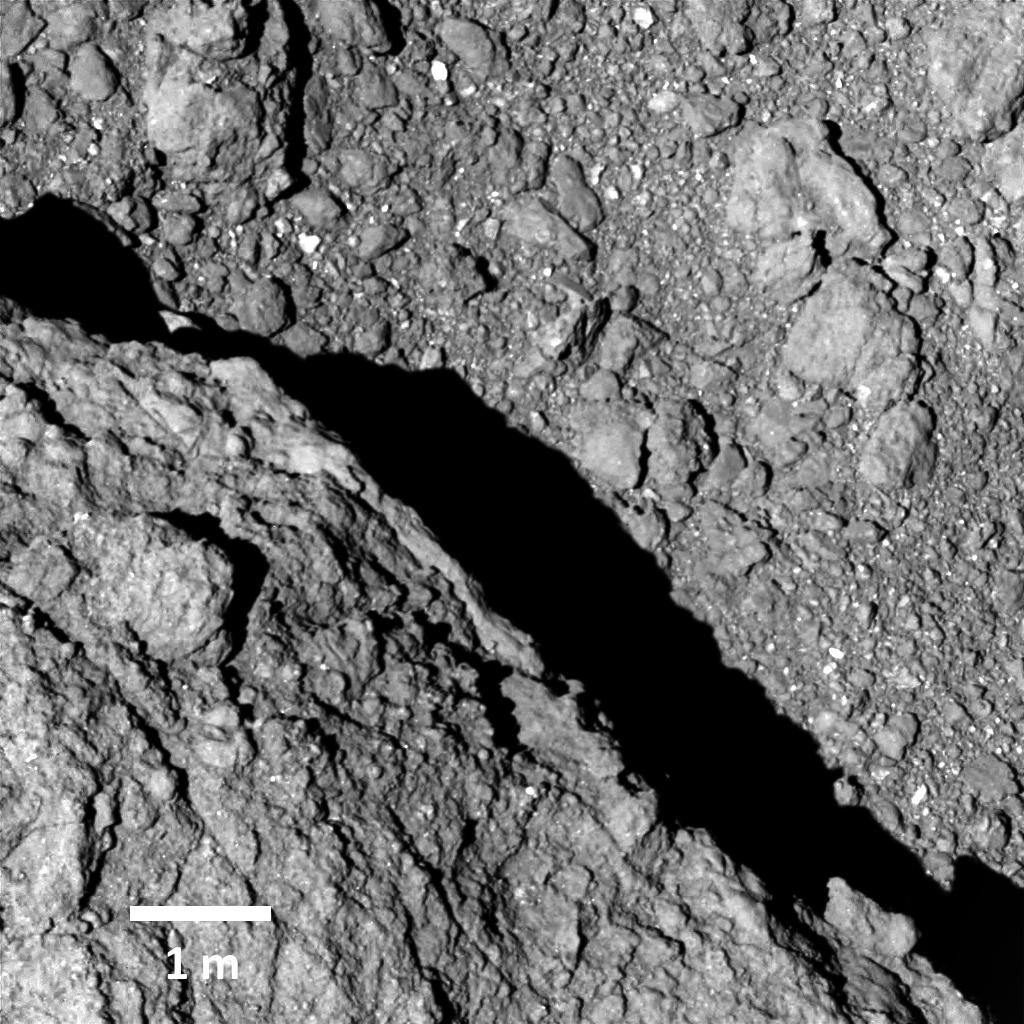 Hayabusa 2's Optical Navigation Camera-T captured this image of Ryugu from an altitude of about 64m. The image was taken on September 21, 2018, at around 13:04 JST. This is the highest resolution photograph obtained of the surface of Ryugu. Credit: JAXA