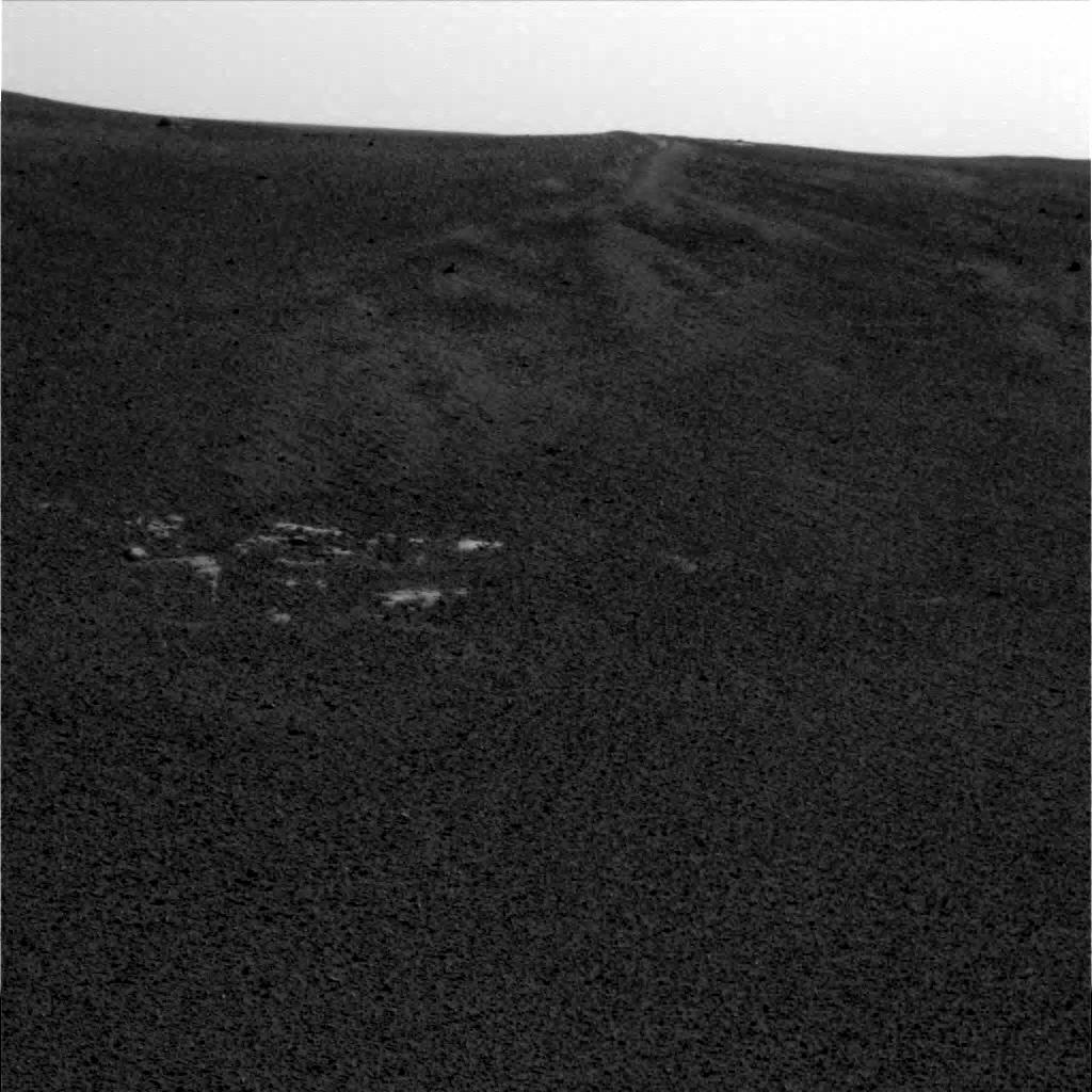 First picture of the opportunity of March on the floor 1 at 15:30:50 pm of March. Captured with the left panning camera. Image Credit: NASA / JPL / Cornell  