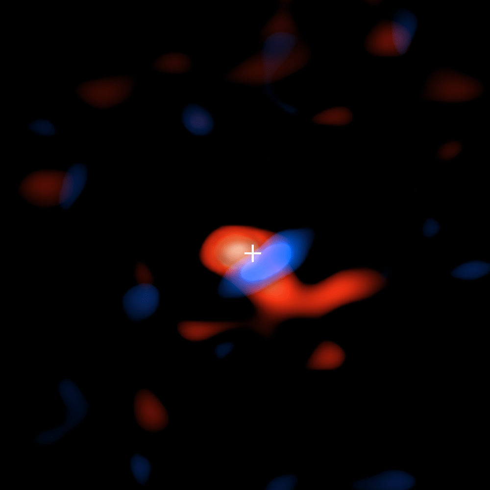 The ALMA image of the frozen hydrogen disc that circulates around the supermassive black hole in the center of our galaxy. The colors represent the movement of the gas with respect to the Earth: the red part moves away, so that the radio waves detected by ALMA are slightly stretched or displaced to the right. 