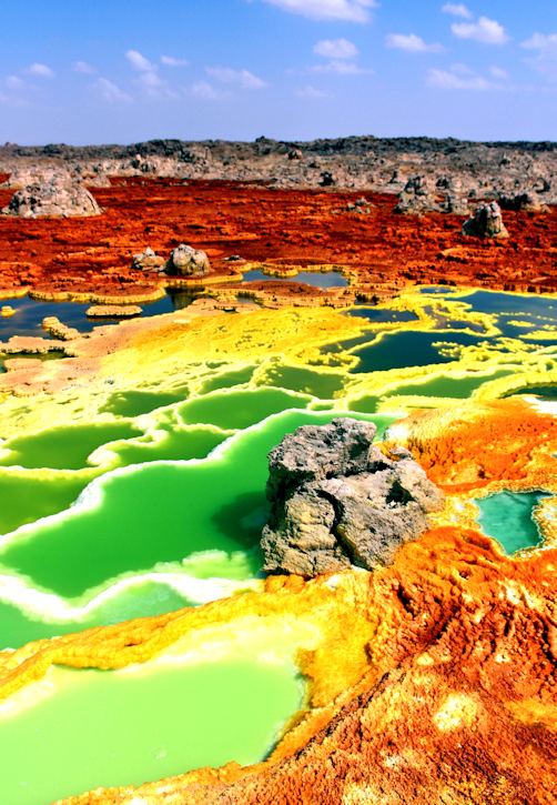 The otherworldly landscape of Dallol, Ethiopia. This is the only place on Earth where scientists have found water, but no life. Extremophiles have found a way to thrive in other extreme environments on Earth, which has generated optimism around finding life in the Solar System. Image Credit: By Kotopoulou Electra - Own work, CC BY-SA 4.0, https://commons.wikimedia.org/w/index.php?curid=74975209 