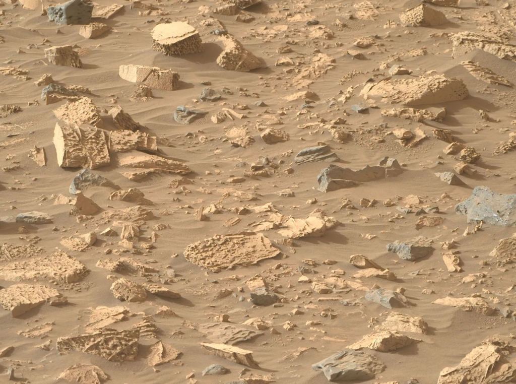These rocks in Bright Angel have unusual popcorn-like textures and abundant mineral veins. Image Credit: NASA/JPL-Caltech/ASU