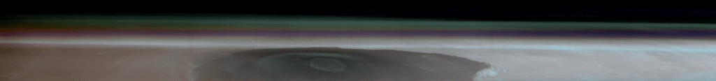 Dust storms typically begin during Martian fall, and the blue layer on the bottom is dust in Mars' atmosphere. Above that is a purplish layer. It's where red dust from the planet's surface is mixed with bluish water ice. The top blue-green layer is where water ice clouds reach 50 km (31 miles) into the sky. Image Credit: NASA/JPL-Caltech/ASU