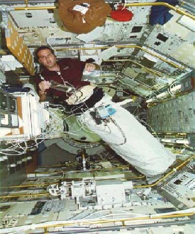 This image showed payload commander Richard Hieb wearing and testing the LBNP on Shuttle mission STS 65 in 1994. By creating lower pressure in the bottom of the body, blood and fluids are prevented from accumulating in the upper body in microgravity. Image Credit: NASA.