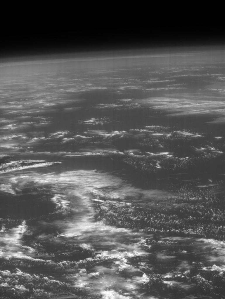 Earth was imaged at dawn on August 20, 2024, by the JANUS optical camera aboard JUICE. The image shows the island of Hawai'i (the dark spot on the left), the largest island in the Hawaiian archipelago in the central Pacific of the United States. The view is very low, after a short while the Earth left the field of view of JANUS. Credits: JANUS team (INAF, ASI, DLR, CSIC-IAA, OpenUniversity, CISAS-Università di Padova and other international partners)