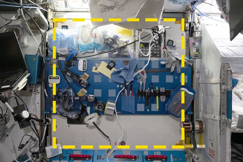 This image shows Square 03 in the starboard Maintenance Work Area of the International Space Station. An open crew birth is on the right. The researchers developed an image analysis platform to process the images and identify artifacts. Image Credit: Walsh et al. 2024.