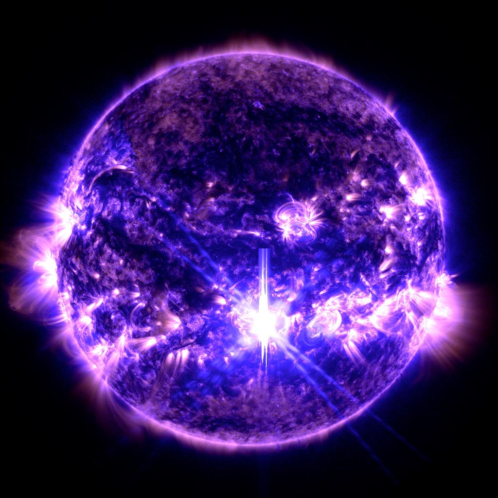 On October 3, 2024, the Sun emitted a strong solar flare. As of this date, this solar flare is the largest of Solar Cycle 25 and is classified as an X9.0 flare. X-class denotes the most intense flares, while the number provides more information about its strength. NASA's Solar Dynamics Observatory captured imagery of this solar flare - as seen in the bright flash in the center - on October 3, 2024. The image shows a blend of 171 Angstrom and 131 Angstrom light, subsets of extreme ultraviolet light.
Image Credit: NASA/SDO