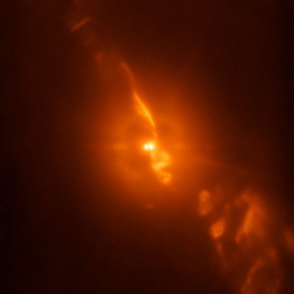 This image of R Aquarii is from the SPHERE planet-hunting instrument on the ESO’s Very Large telescope in 2018. It was captured while the instrument was being tested, and astronomers were able to capture dramatic details of the turbulent stellar relationship with unprecedented clarity. This image is from the SPHERE/ZIMPOL observations of R Aquarii, and shows the binary star itself, as well as the jets of material spewing from the stellar couple. Image Credit: By ESO/Schmid et al. - https://www.eso.org/public/images/eso1840a/, CC BY 4.0, https://commons.wikimedia.org/w/index.php?curid=75014181