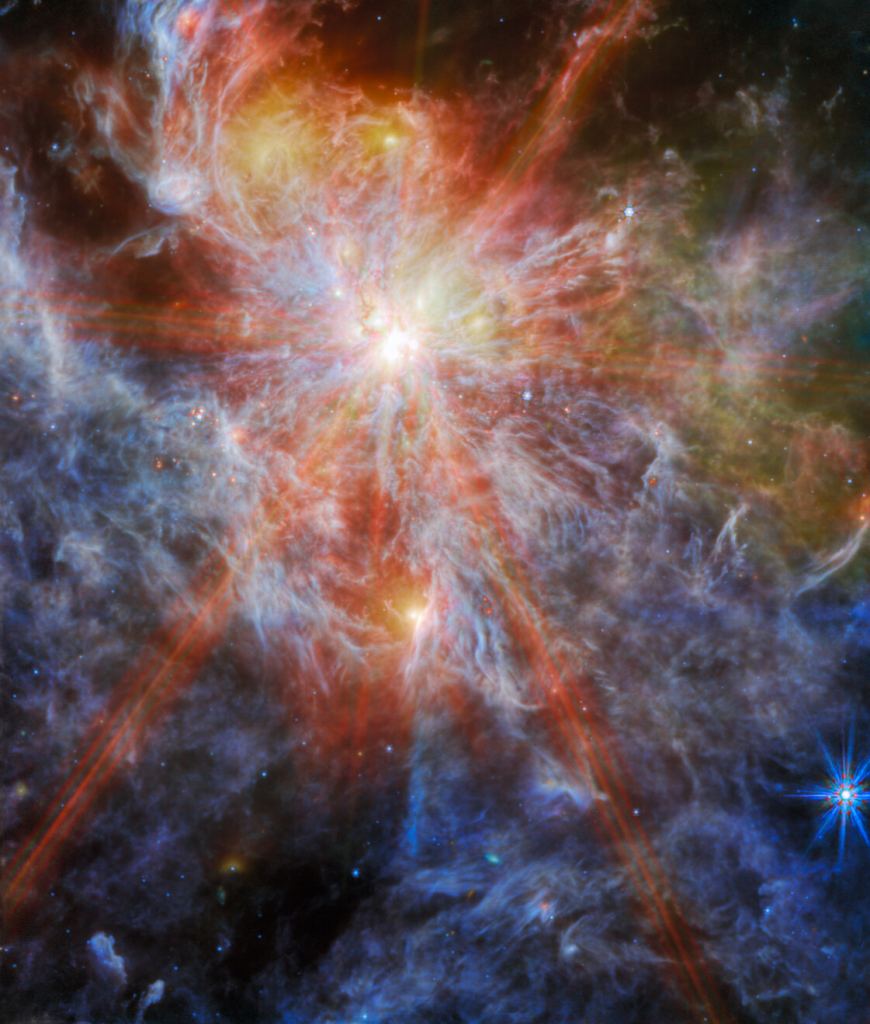 This image from the NASA/ESA/CSA James Webb Space Telescope shows N79, a region of interstellar atomic hydrogen that is ionized and is captured here by Webb's Mid-InfraRed Instrument (MIRI). N79 is a massive star-forming complex spanning roughly 1630 light-years in the generally unexplored southwest region of the LMC. At the longer wavelengths of light captured by MIRI, Webb's view of N79 showcases the region's glowing gas and dust. Star-forming regions such as this are of interest to astronomers because their chemical composition is similar to that of the gigantic star-forming regions observed when the Universe was only a few billion years old, and star formation was at its peak. Image Credit: ESA/Webb, NASA & CSA, M. Meixner CC BY 4.0 INT