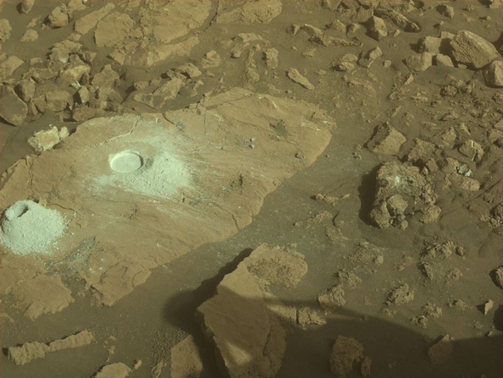 NASA's Mars Perseverance rover acquired this image of the area in front of it. It shows the Serpentine Lake abrasion patch on the right-hand side of the rock, with the Green Gardens sampling location on the left. The rover used its onboard Front Right Hazard Avoidance Camera A and captured the image on Feb. 16, 2025 (sol 1420, or Martian day 1,420 of the Mars 2020 mission) at the local mean solar time of 16:45:19. Image Credit: NASA/JPL-Caltech